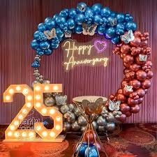 25th Anniversary Modern Balloon Arch Decor In Blue And Rose Gold With Neon Sign - anniversary room decoration by ARV Decor