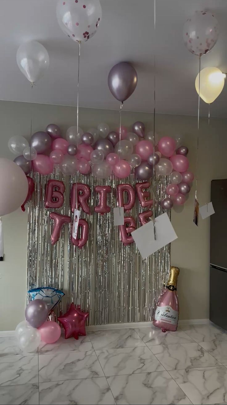 Pink And Silver Bridal Shower Decor With Balloon Arch And Bride To Be Backdrop