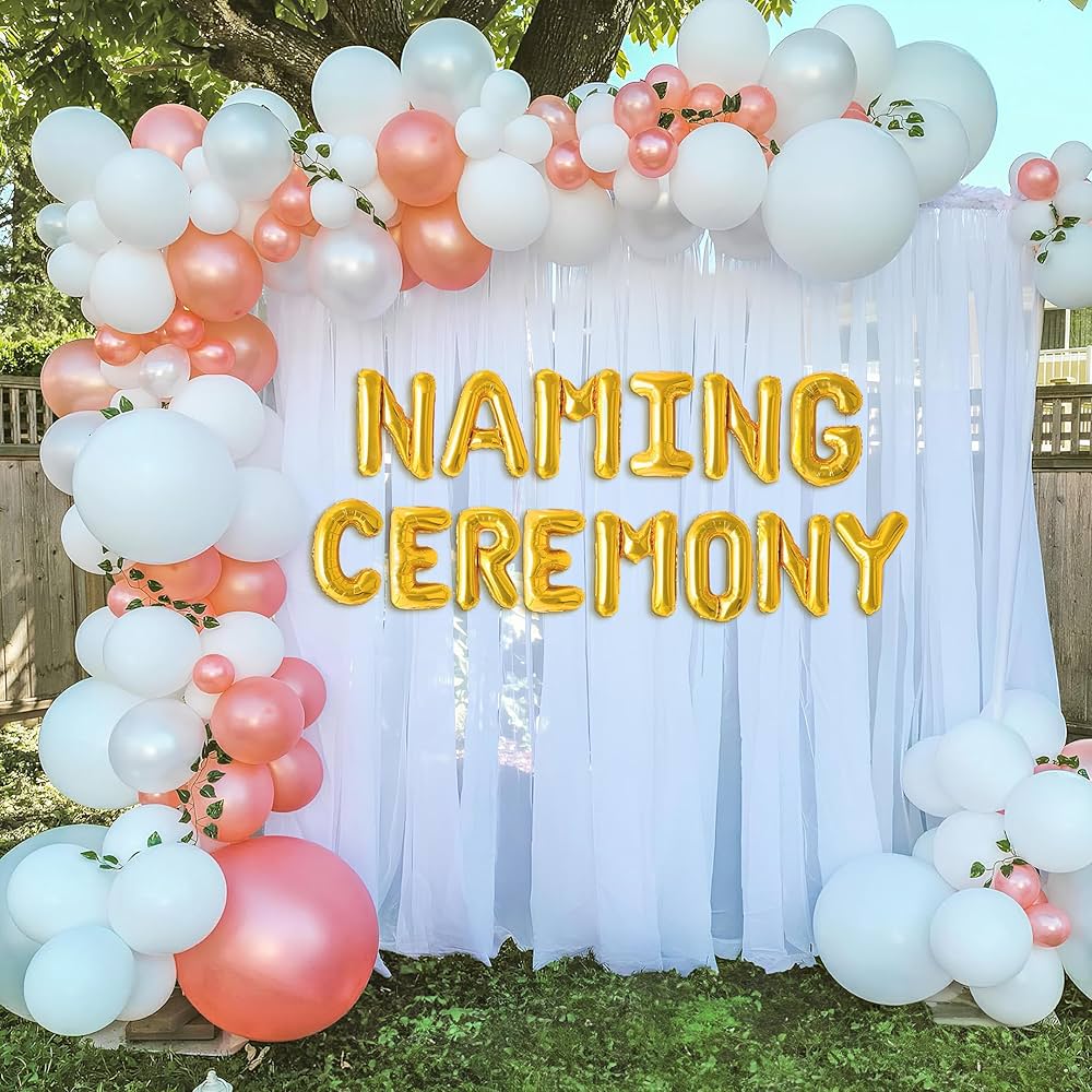 Modern Naming Ceremony Decor With Peach White Balloon Arch And Gold Balloons