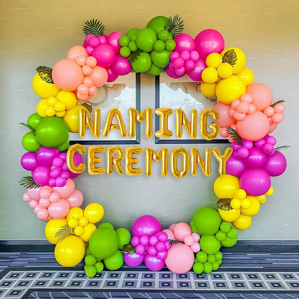 Vibrant Naming Ceremony Balloon Arch with Pink, Yellow, and Green Modern Decor