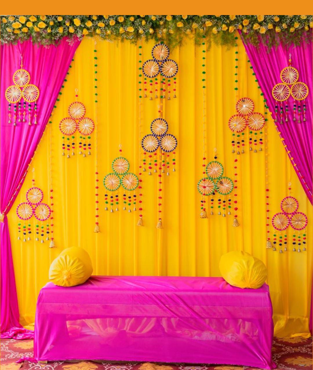 Traditional Wedding Haldi Stage With Yellow And Pink Fabric Backdrop - wedding decoration by ARV Decor