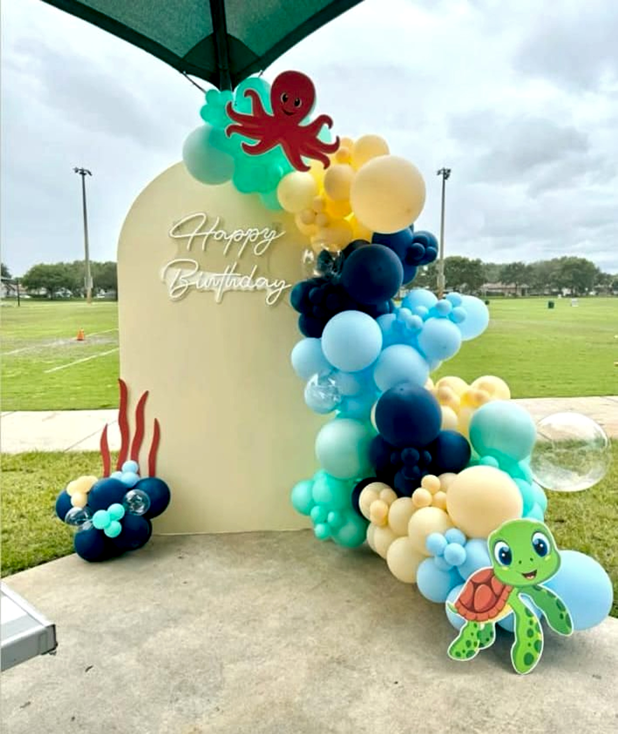 Under The Sea Kids Birthday Decor With Blue Balloon Arch And Cartoon Cutouts - Kids Birthday Decoration by ARV Decor thumbnail 2