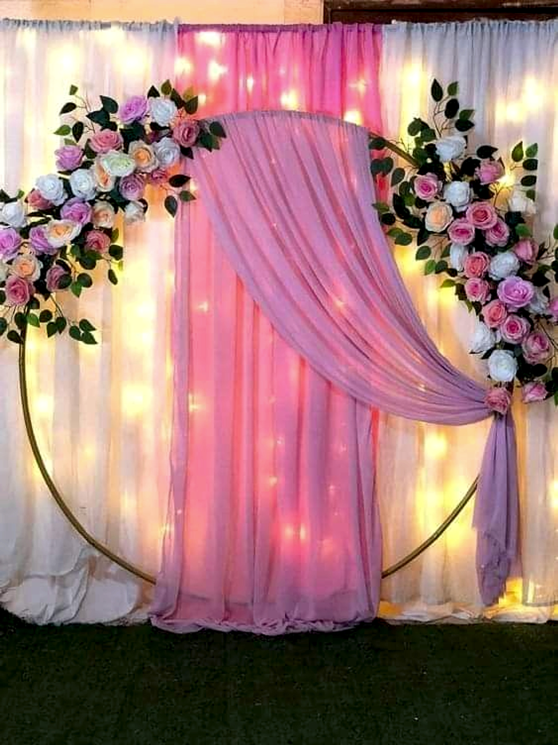 Elegant Pink And White Floral Wedding Stage With Circular Backdrop And Fairy Lights - Engagement by ARV Decor thumbnail 2