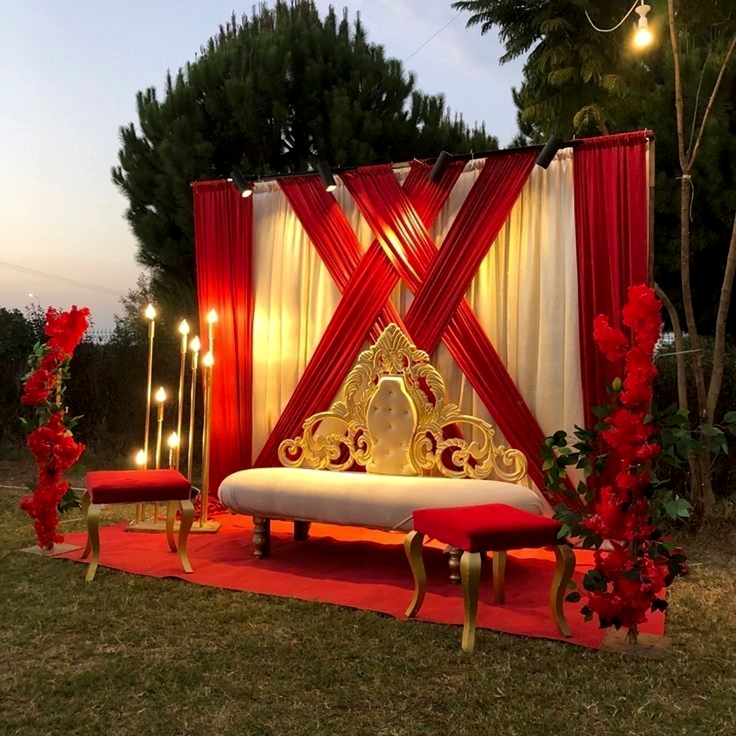 Luxury Red And Gold Wedding Stage Decor With Elegant Sofa Backdrop - Wedding Knots by ARV Decor thumbnail 2