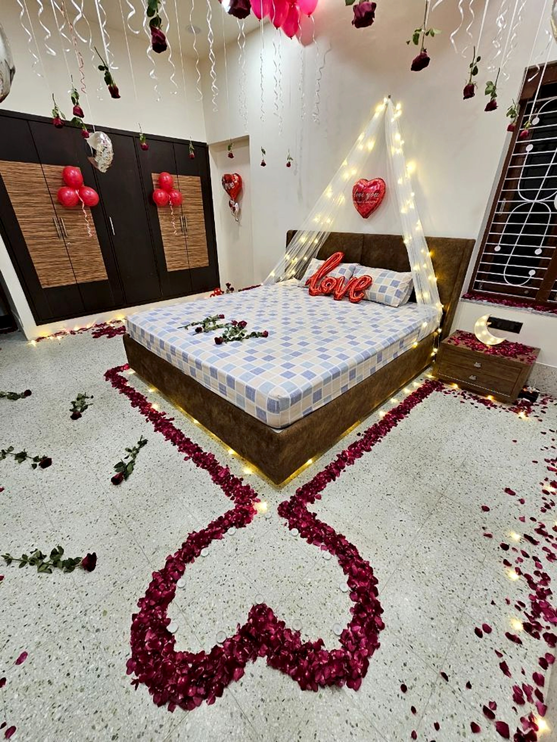 Romantic Anniversary Room Decoration with Red Balloons, Rose Petals, and Love Lights - Wedding Knots by ARV Decor thumbnail 2